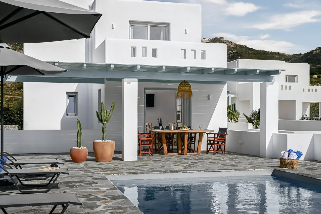 Poolside terrace and white Cycladic architecture