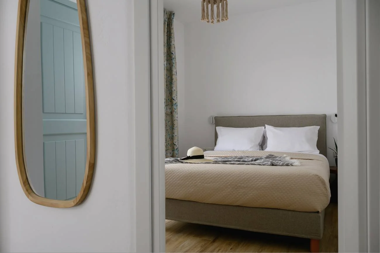 Bedroom seen through a traditional doorway