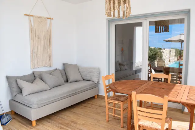 Living and dining space opening onto the terrace