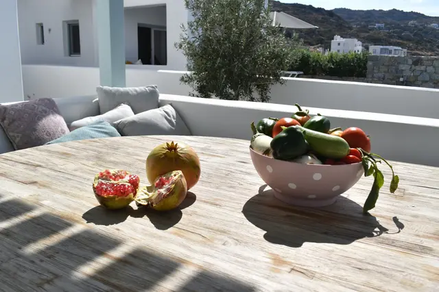 Outdoor dining beneath the pergola