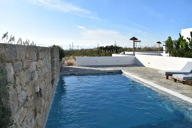 Swimming pool and garden at Naxian Garden Villas, Naxos
