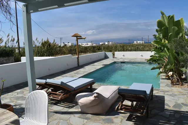 Swimming pool and garden at Naxian Garden Villas, Naxos