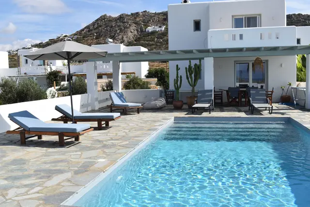 Swimming pool and garden at Naxian Garden Villas, Naxos