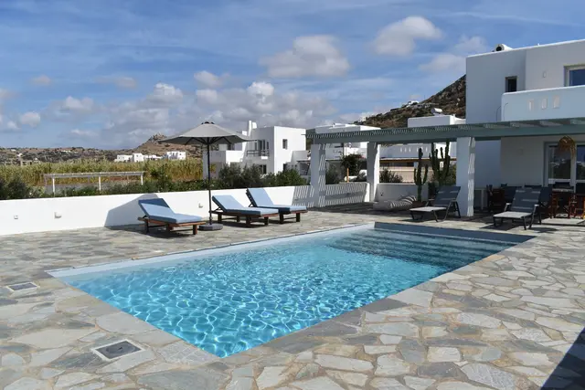Swimming pool and garden at Naxian Garden Villas, Naxos