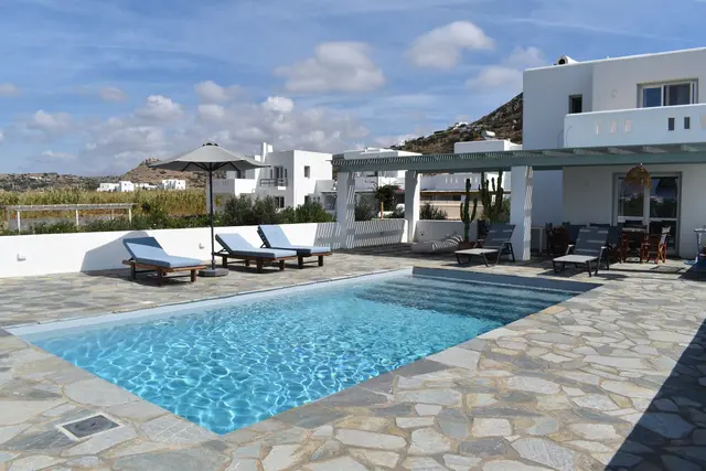 Swimming pool and garden at Naxian Garden Villas, Naxos