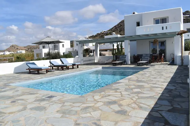 Swimming pool and garden at Naxian Garden Villas, Naxos