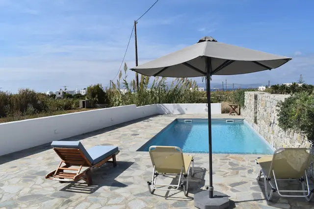 Swimming pool and garden at Naxian Garden Villas, Naxos