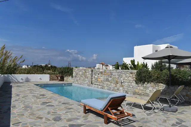 Swimming pool and garden at Naxian Garden Villas, Naxos