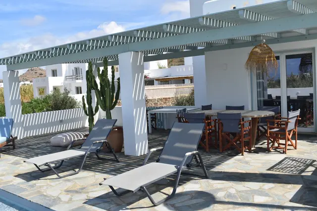 Shaded terrace and poolside seating
