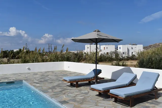Shaded terrace and poolside seating