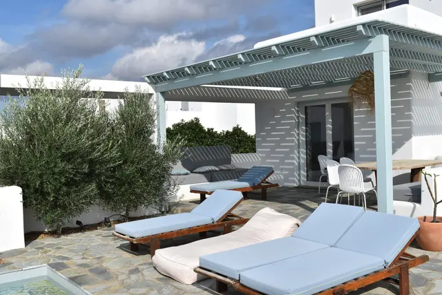 Shaded terrace and poolside seating